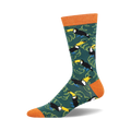 Crew socks in teal green, featuring a pattern of colorful toucans and banana leaves.  Orange cuffs add a vibrant touch.