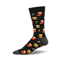 A single black crew sock with a fun pixelated design of burgers and french fries in red and yellow.  Gray reinforced heel and toe.