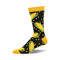 A-Maize-Ing Bamboo crew socks showcasing a whimsical design of yellow corn cobs and green leaves on a black background.  Mustard yellow cuffs.