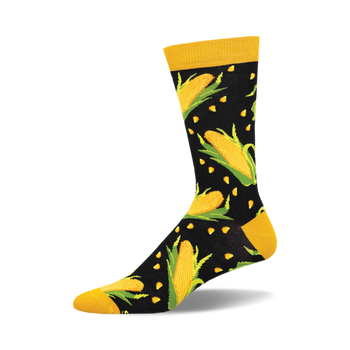 socks that are black with a pattern of yellow corncobs with green husks. the top of the sock is solid yellow.