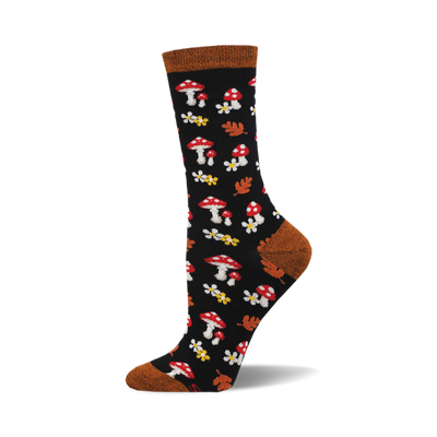 the sock is black with an allover pattern of red and orange mushrooms, white and yellow flowers, and brown and orange leaves. the cuff is brown with a geometric pattern in orange. the heel and toe are brown.