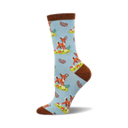 Crew socks in light blue with a repeating pattern of brown fawns, green leaves, and red mushrooms. Brown cuff detail.