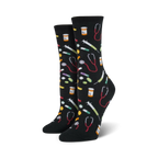 Pair of crew socks in black and blue; colorful pills, syringes, and stethoscopes are playfully scattered across the design.