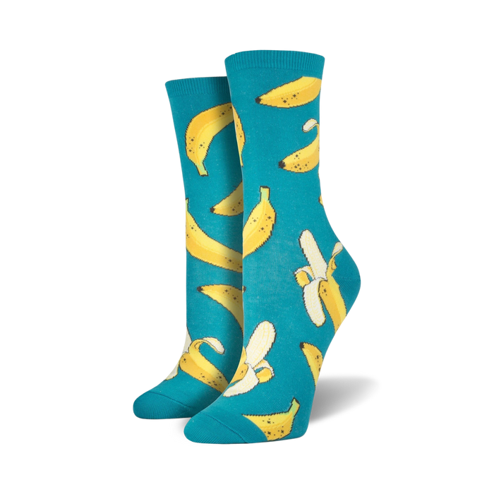 blue crew socks with yellow bananas that are peeling and have brown stems.    }}
