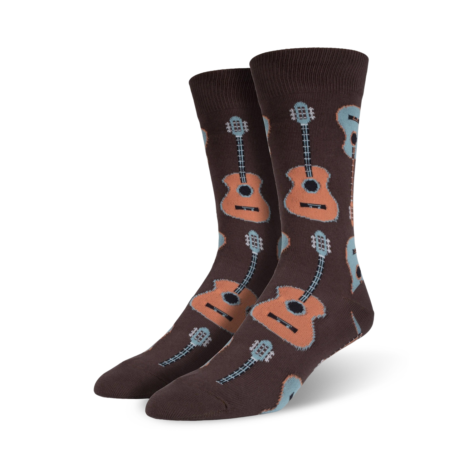 Lifestyle shot: Model wearing brown crew socks with a pattern of light brown and blue guitars.
