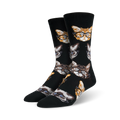 A pair of black crew socks with a repeating pattern of cats wearing glasses. The cats are orange, brown, and gray.