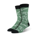 Pair of sage green crew socks with white mathematical formulas, equations, and geometric shapes printed on them. Black cuff.