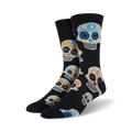 Pair of black crew socks with a colorful sugar skull pattern.  Orange, blue, and yellow details on the skulls against a black background.