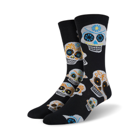 mens crew socks in black with a pattern of multi-colored sugar skulls for day of the dead.  