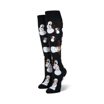 black knee-high socks with white snowmen with carrot noses, red scarves, and black hats. 