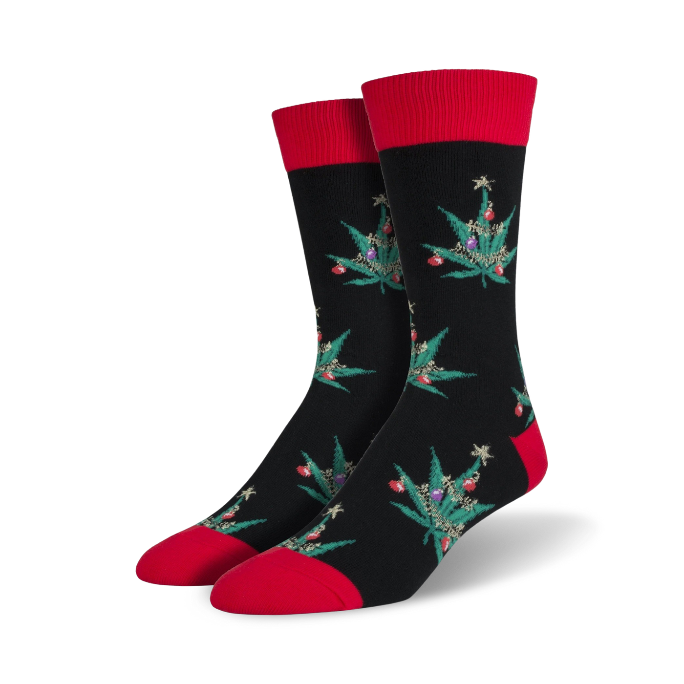 Pair of crew socks; black with red cuffs; features a repeating pattern of marijuana leaf Christmas trees with colorful ornaments.