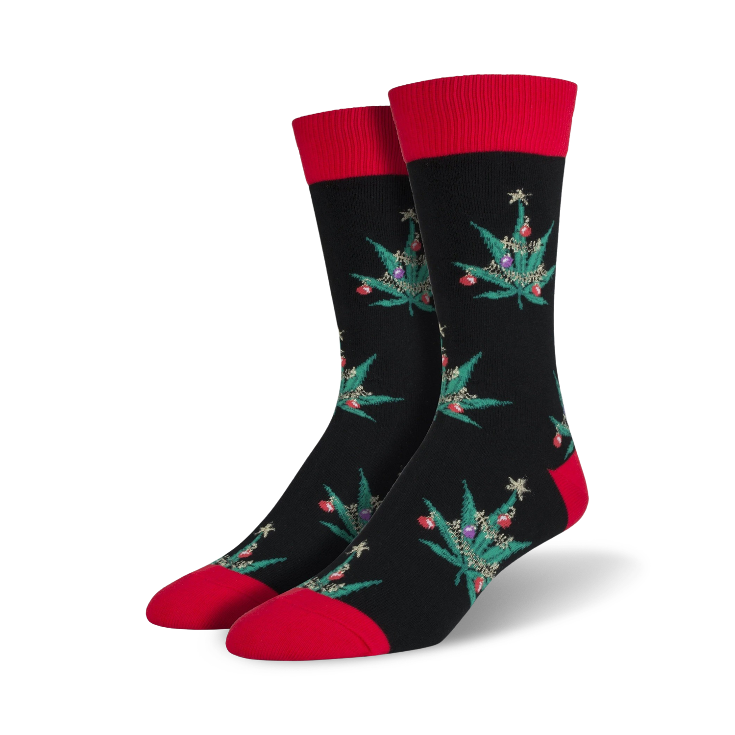 Pair of crew socks; black with red cuffs; features a repeating pattern of marijuana leaf Christmas trees with colorful ornaments.
