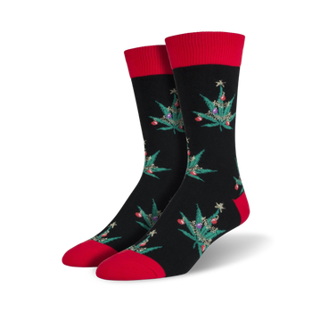black crew socks with all-over marijuana leaf pattern, stars, and ornaments.  