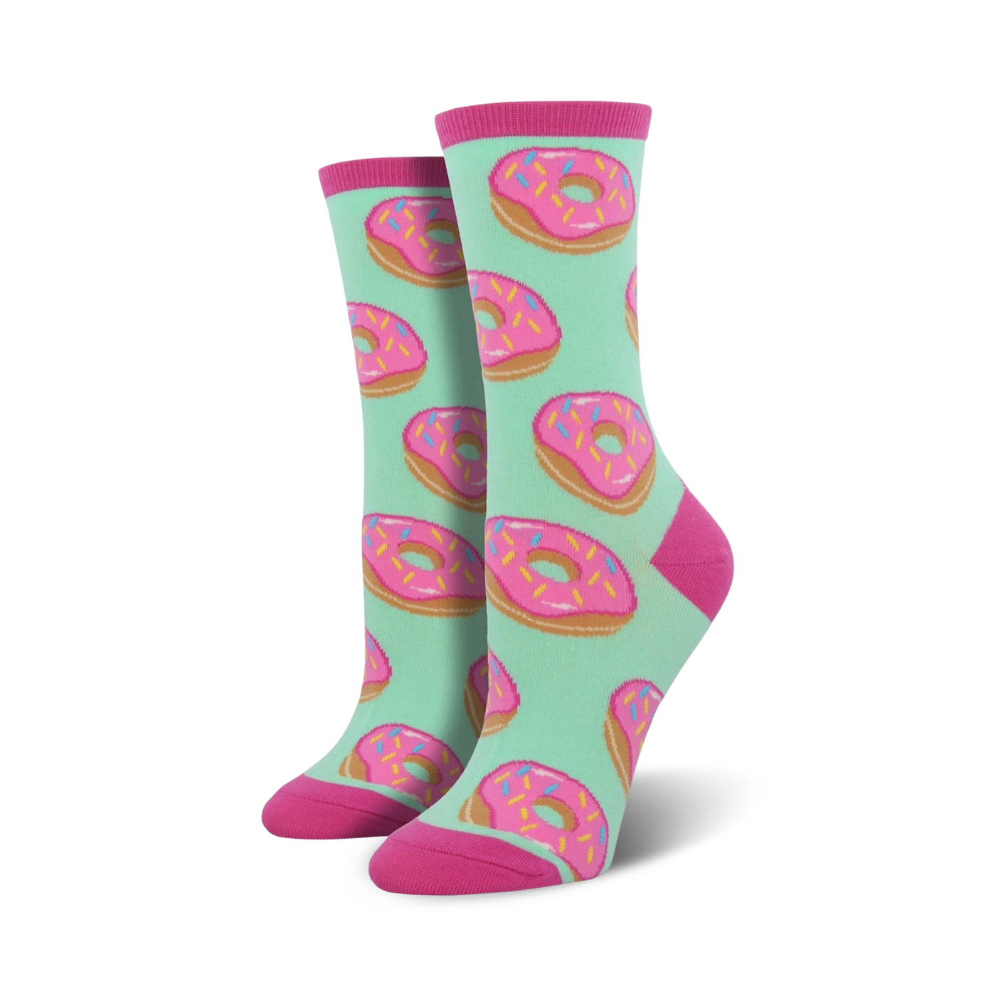 A pair of women's crew socks with a mint green background and a repeating pattern of pink donuts with colorful sprinkles.