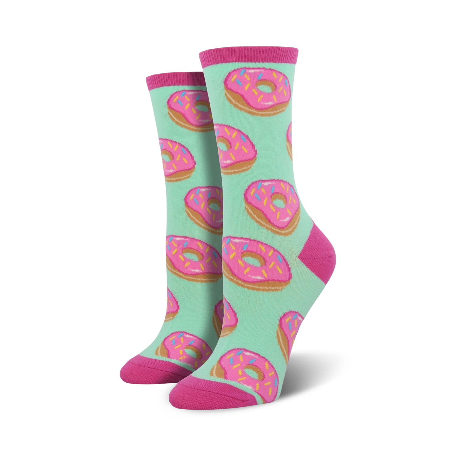 A pair of women's crew socks with a mint green background and a repeating pattern of pink donuts with colorful sprinkles.