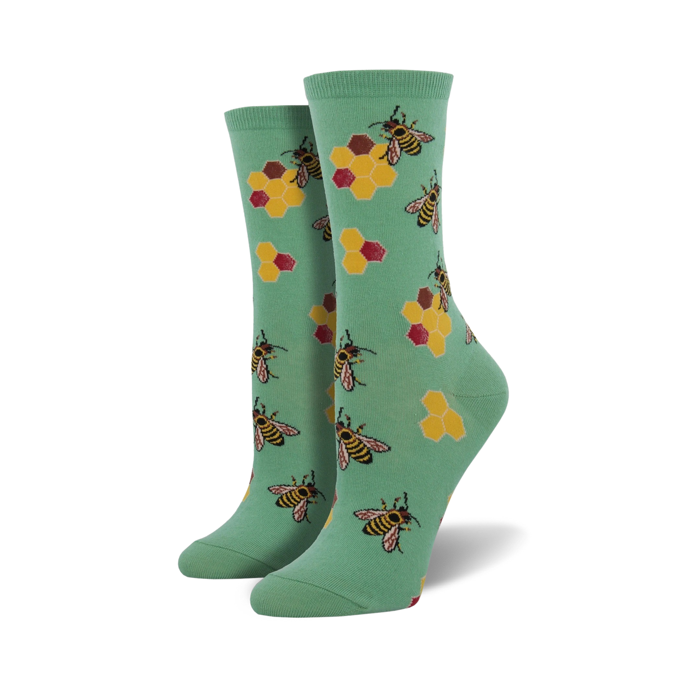 Lifestyle shot of a person wearing the mint green Busy Bees socks.