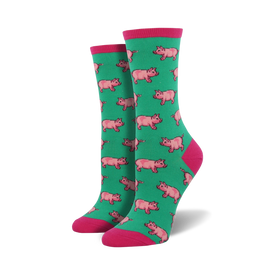 womens' green crew socks with pink cartoon pigs wearing hats and different colored feet; pink toe, heel, and green cuff.  