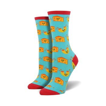 blue women's crew length socks designed with a cartoon macaroni and cheese pattern in orange and yellow, with a red toe and heel.    