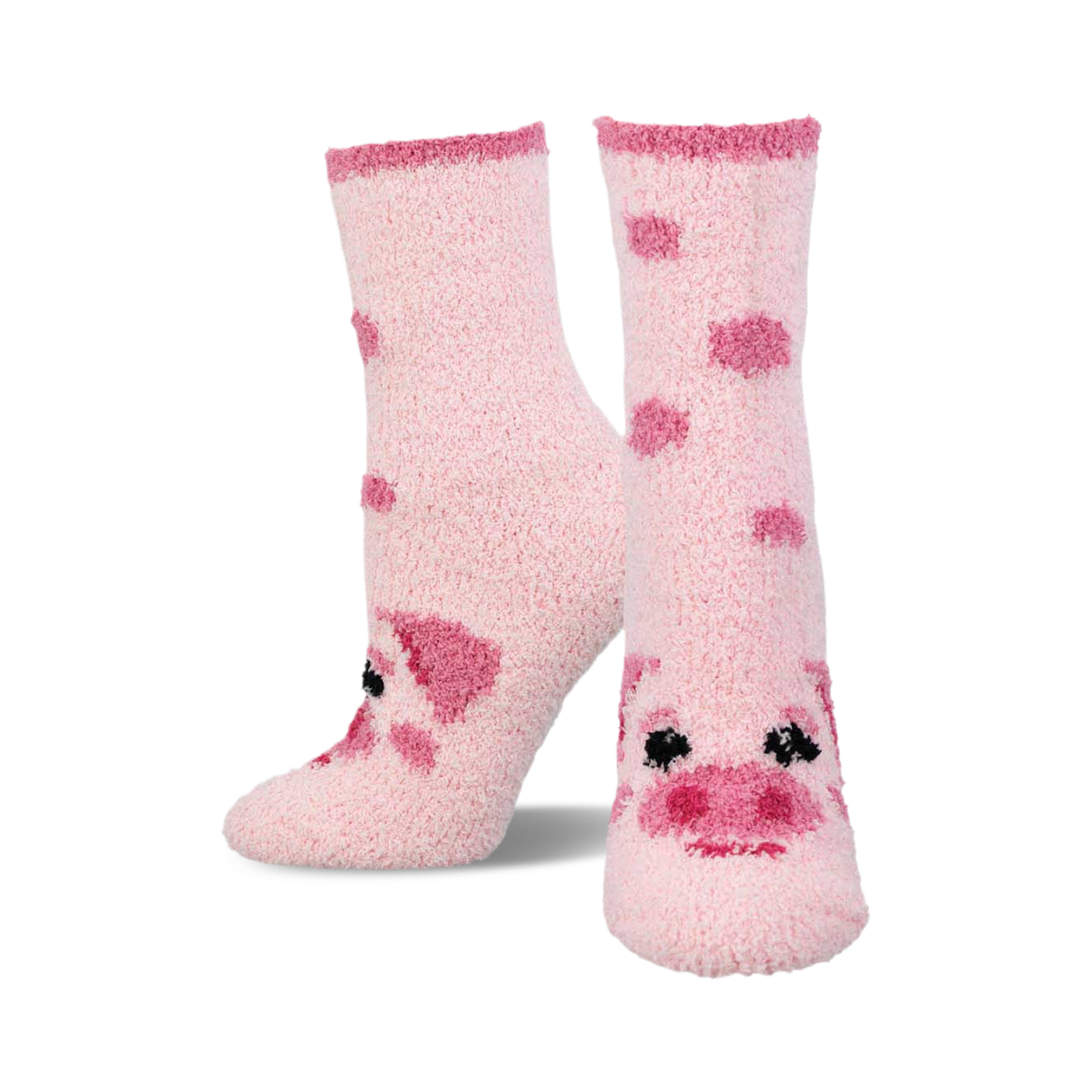 Pair of pink fuzzy crew socks with scattered pig face designs. The socks are light pink with darker pink pig features.