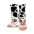 Pair of fuzzy crew socks featuring a black and white cow pattern with pink accents.  The toes are a solid pink.