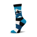 Crew socks in teal, white, and black, featuring an orca whale graphic against a blue ocean background.  Cozy wool blend.