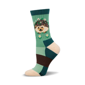 a green, teal, brown, and cream sock with a hedgehog wearing a flower crown on it.