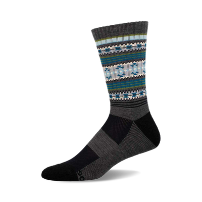 a grey sock with a blue, green, and white geometric pattern on the top of the sock.