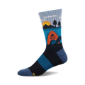 Kayak at Sunrise Wool socks showcasing a crew sock style with blues, grays, oranges, and a kayak scene graphic.