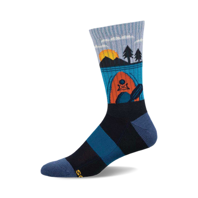 a blue, black, and orange patterned sock with a sunset scene and a kayak.