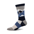 Crew socks showcasing an orca whale amid icy blue and gray geometric patterns.  Features a navy blue, gray, and light blue color scheme.