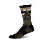 Crew socks in olive green, black, and beige, featuring a moose illustration and mountain landscape print.