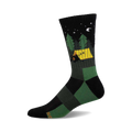 Crew socks in black and green featuring a bear sleeping in a yellow tent surrounded by pine trees at night.