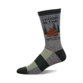 A gray crew wool sock with a humorous graphic of poop in the woods, accented with green and dark gray stripes at the bottom.
