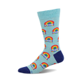 Crew socks in pastel blue with repeating rainbow designs and 'PRIDE' text. The socks have a navy blue cuff.