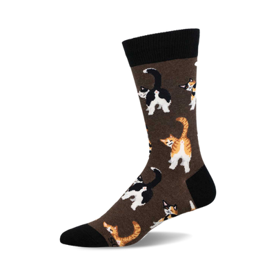 a brown sock with a black cuff and black toe. it has a pattern of multiple cats facing away from the viewer. the cats are orange and white, and black and white.