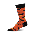 Orange crew socks with black bats and candy corn designs. Black cuff. Fun Halloween socks.