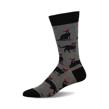 A grey crew sock with a pattern of black cats wearing tiny red horns. The sock has a black cuff.