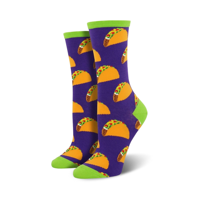 purple crew socks for women with an all-over pattern of yellow tacos with brown and red fillings. green toes and heels.  