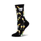 Black crew socks with a fun design of champagne bottles, glasses, and ice buckets in gold and green.