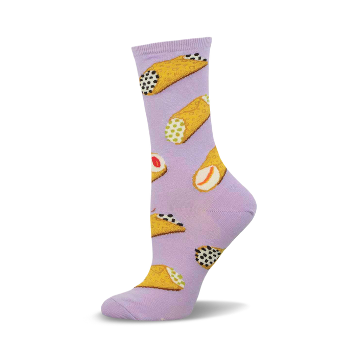 a pair of lavender socks with a pattern of cannoli.  the cannoli are filled with ricotta cheese and topped with chocolate chips. }}