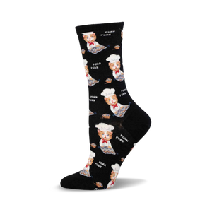 Crew socks in black with a repeating pattern of orange tabby cats wearing chef hats and baking muffins.  The words 'Purr' are also printed on the socks.
