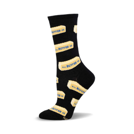 a black sock with a repeated pattern of yellow butter sticks printed on it. each stick has "4 oz. butter" printed on it in blue. the sock is shown from the side, with the toe of the sock at the bottom.