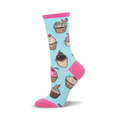Crew socks in pastel blue with colorful cupcake designs. Pink accents at the top and toe.