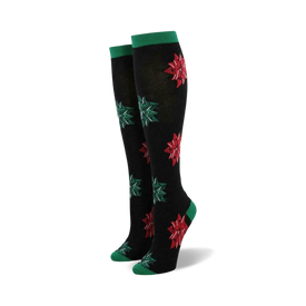 women's black knee high socks with a pattern of red and green bows for christmas.   