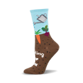 Crew socks in brown and light blue. Design includes a watering can, carrots, and beets emerging from the ground. Text says, "Rooting for you."