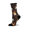 A brown crew sock with a pattern of colorful cats' backsides.  The cats are orange, black, and white.