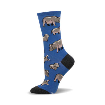 Crew socks in blue featuring a pattern of cartoon hippos in varying sizes. The socks have a grey heel and toe.