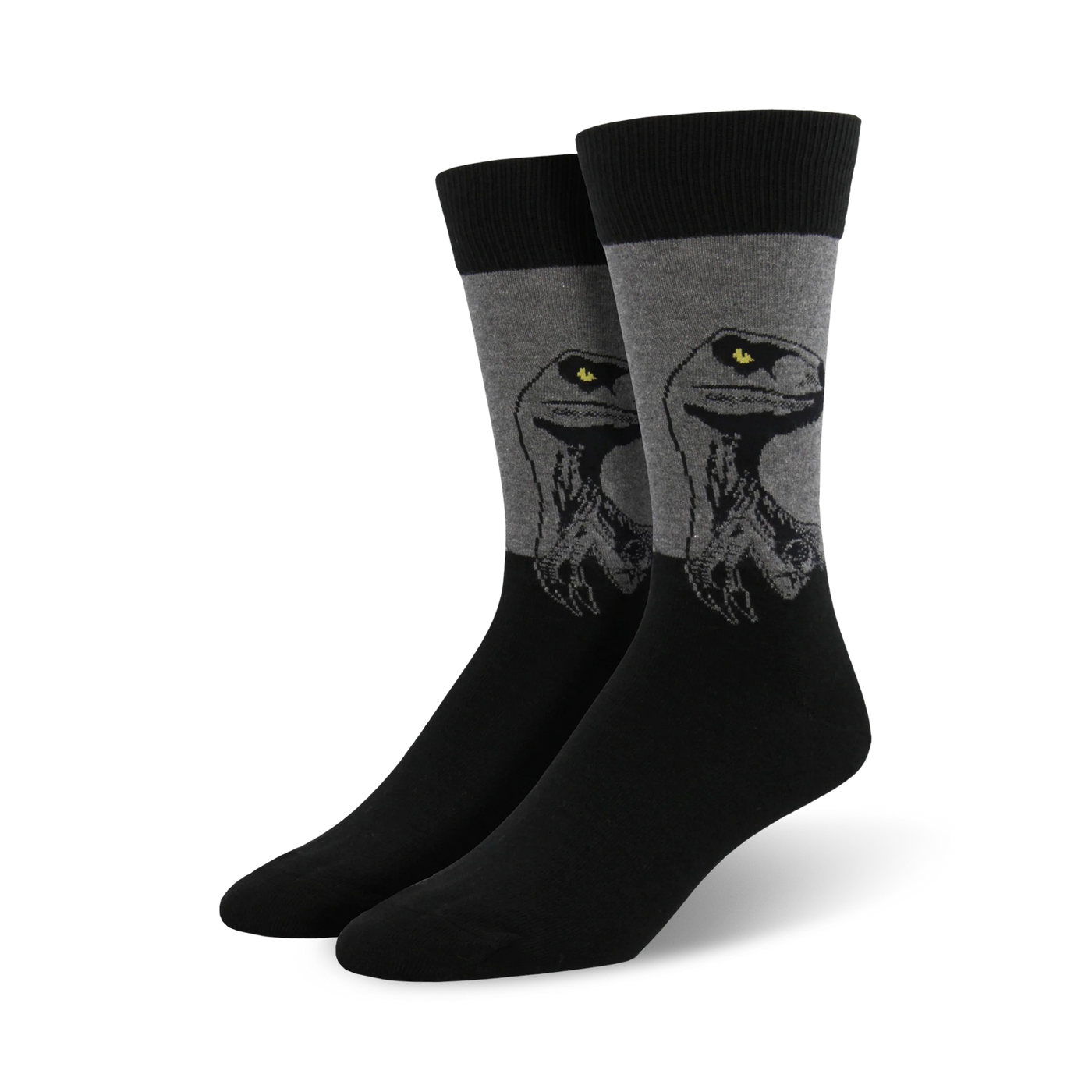 A pair of men's crew socks in black and gray. The socks feature a graphic design of a raptor's head, with yellow eyes.