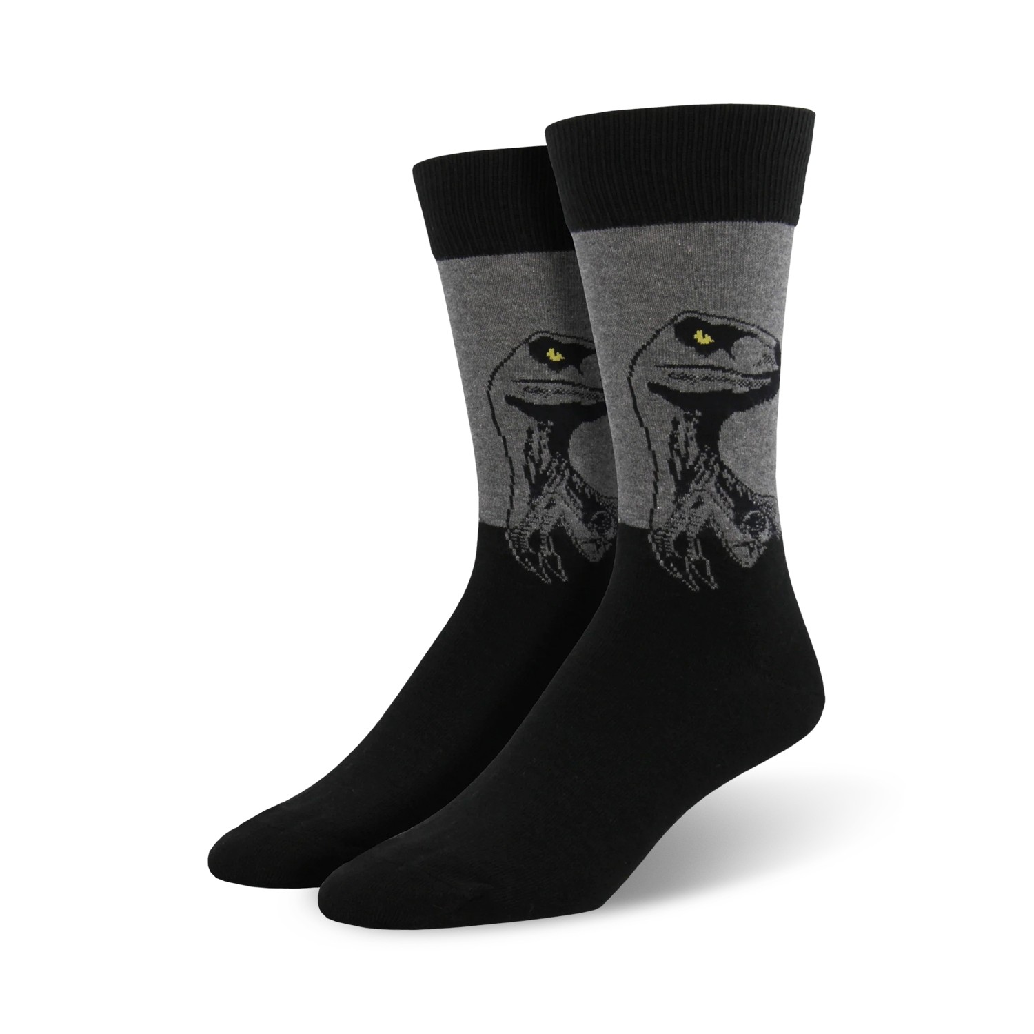 A pair of men's crew socks in black and gray. The socks feature a graphic design of a raptor's head, with yellow eyes.