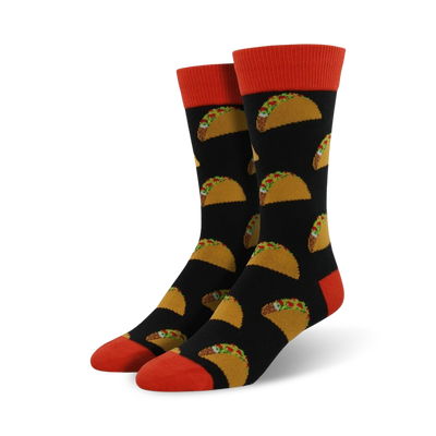 black crew socks feature fun cartoon tacos with hard shells, ground beef, lettuce, tomato, cheese, & red sauce.  